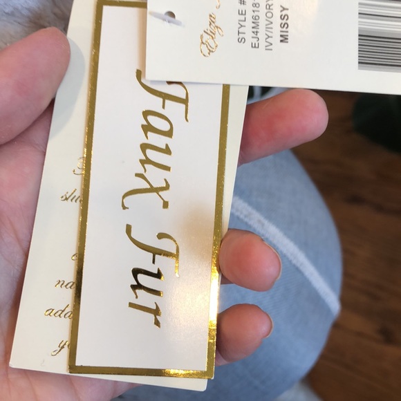 NWT- Make a statement with this beautiful bolo shrug, that is luxuriously soft. - Picture 6 of 8